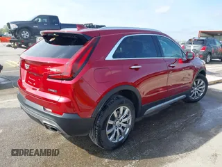 2019 Cadillac XT4 FWD Premium Luxury with VIN 1GYFZCR45KF125884, listed as a IAAI auction lot 41905282 with 68,470 mi miles. Bid and sale history available at carsss.com. Image 4.