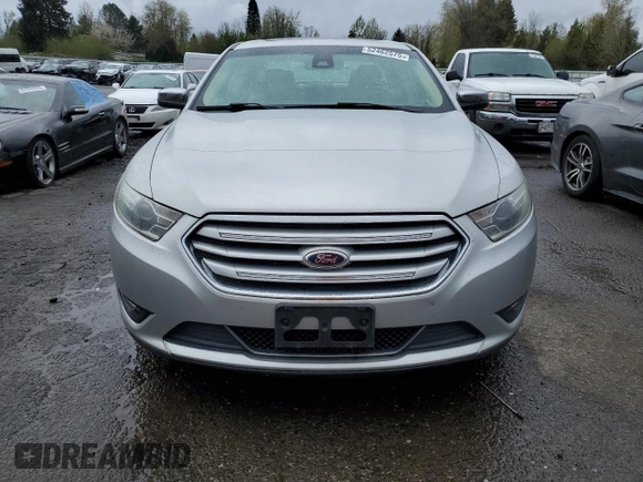 2013 Ford Taurus Limited z VIN 1FAHP2J89DG141683, wystawiony jako Copart lot #52462575 z przebiegiem 77 235 mil mil oraz Czysty tytuł • Clean title. Historia ofert i sprzedaży dostępna na DreamBid. Obrazek 5.