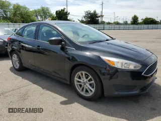 2018 Ford Focus SE z VIN 1FADP3F2XJL276652, wystawiony jako Copart lot #57499965 z przebiegiem 112 388 mil mil oraz Szkoda całkowita • Salvage title. Historia ofert i sprzedaży dostępna na DreamBid. Obrazek 4.
