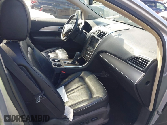 2014 Lincoln MKX with VIN 2LMDJ8JK4EBL10705, listed as a IAAI auction lot 41870228 with 166,527 mi miles and . Bid and sale history available at DreamBid. Image 5.