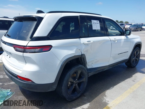 2022 Jeep Grand Cherokee Laredo with VIN 1C4RJHAG1N8627233, listed as a IAAI auction lot 42343190 with 38,107 mi miles and . Bid and sale history available at DreamBid. Image 4.