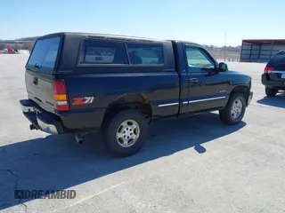 1999 Chevrolet Silverado 1500 LS with VIN 1GCEK14T9XZ213688, listed as a IAAI auction lot 41818993 with 192,743 mi miles. Bid and sale history available at carsss.com. Image 4.