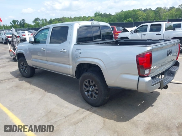 2023 Toyota Tacoma SR with VIN 3TYCZ5AN4PT149730, listed as a IAAI auction lot 42083146 with 31,731 mi miles and . Bid and sale history available at DreamBid. Image 3.