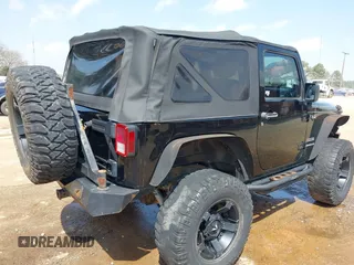 2010 Jeep Wrangler Sport with VIN 1J4AA2D15AL161650, listed as a IAAI auction lot 41805852 with 89,952 mi miles and . Bid and sale history available at carsss.com. Image 4.