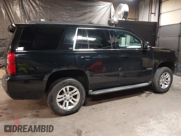 2017 Chevrolet Tahoe LT with VIN 1GNSKBKC4HR231701, listed as a IAAI auction lot 41201223 with 80,045 mi miles and . Bid and sale history available at DreamBid. Image 4.