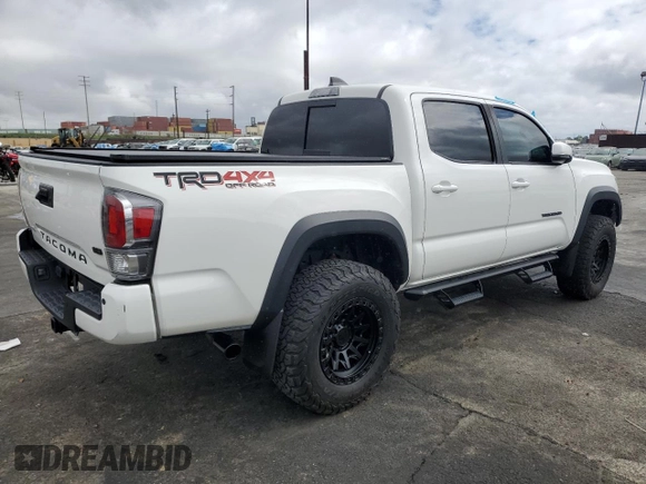2021 Toyota Tacoma 4WD SR with VIN 3TMCZ5AN5MM431429, listed as a Copart auction lot 48203175 with 22,108 mi miles and Salvage Title. Bid and sale history available at carsss.com. Image 3.
