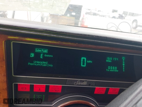 1991 Cadillac Seville z VIN 1G6KS53B2MU813855, wystawiony jako IAAI lot #42425470 z przebiegiem 168 194 mil mil oraz . Historia ofert i sprzedaży dostępna na DreamBid. Obrazek 7.