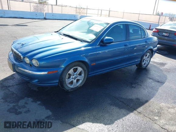 2002 Jaguar X-Type with VIN SAJEA51C42WC11103, listed as a IAAI auction lot 41699366 with 106,418 mi miles and . Bid and sale history available at DreamBid. Image 2.
