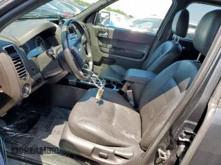 2008 Ford Escape Limited z VIN 1FMCU04138KB77500, wystawiony jako Copart lot #51249415 z przebiegiem 106 667 mil mil oraz Szkoda całkowita • Salvage title. Historia ofert i sprzedaży dostępna na DreamBid. Obrazek 7.