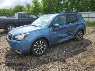 2017 Subaru Forester Touring with VIN JF2SJGWC9HH574837, listed as a Copart auction lot 60128065 with Not provided miles and Salvage title. Bid and sale history available at DreamBid. Image 1.