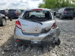 2011 Mazda 2 Sport z VIN JM1DE1HY1B0124249, wystawiony jako Copart lot #56141275 z przebiegiem 249 890 mil mil oraz Szkoda całkowita • Salvage title. Historia ofert i sprzedaży dostępna na DreamBid. Obrazek 6.