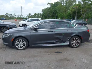 2015 Chrysler 200 Limited with VIN 1C3CCCABXFN700940, listed as a IAAI auction lot 42618405 with 139,141 mi miles and . Bid and sale history available at DreamBid. Image 14.