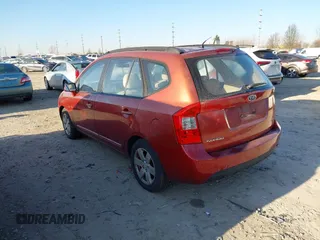 2008 Kia Rondo LX with VIN KNAFG526587147323, listed as a IAAI auction lot 41550909 with 150,967 mi miles. Bid and sale history available at carsss.com. Image 3.