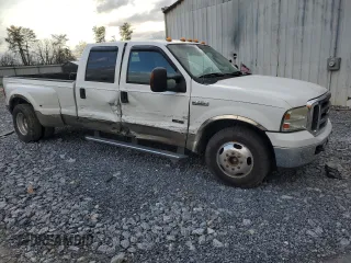 2005 Ford F-350 XL с VIN 1FTWW32P55EA54456, выставлен на аукционе Copart как лот 84890534 с пробегом 128 220 миль миль и Списание • Salvage title. История ставок и продаж доступна на DreamBid. Изображение 4.