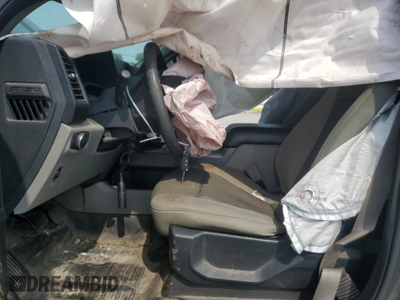 2018 Ford F-150 XL with VIN 1FTEW1E59JFE10695, listed as a Copart auction lot 60171325 with 134,904 mi miles and Salvage title. Bid and sale history available at DreamBid. Image 7.