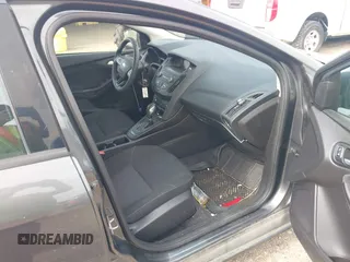 2018 Ford Focus SE with VIN 1FADP3F29JL288761, listed as a IAAI auction lot 42290510 with 93,463 mi miles and . Bid and sale history available at DreamBid. Image 5.