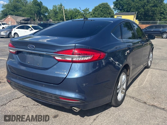2018 Ford Fusion Hybrid SE with VIN 3FA6P0LU7JR261105, listed as a Copart auction lot 55692065 with 122,782 mi miles and Clean Title. Bid and sale history available at carsss.com. Image 4.