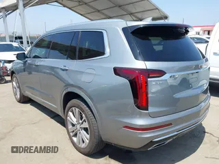 2023 Cadillac XT6 FWD Premium Luxury with VIN 1GYKPCRS6PZ163018, listed as a IAAI auction lot 42437403 with 21,366 mi miles and . Bid and sale history available at DreamBid. Image 3.