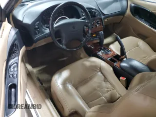 1998 Chrysler Sebring LXi z VIN 4C3AU52N6WE127896, wystawiony jako Copart lot #80051754 z przebiegiem 71 034 mil mil oraz Szkoda całkowita • Salvage title. Historia ofert i sprzedaży dostępna na DreamBid. Obrazek 8.