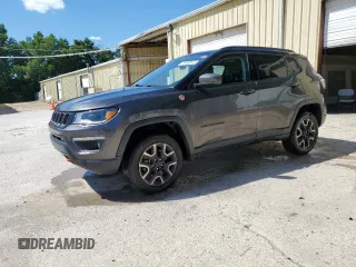 2021 Jeep Compass Trailhawk with VIN 3C4NJDDB7MT598280, listed as a Copart auction lot 58241695 with 116,928 mi miles and Salvage title. Bid and sale history available at DreamBid. Image 1.