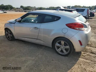 2014 Hyundai Veloster with VIN KMHTC6AD3EU182927, listed as a Copart auction lot 71044954 with 174,222 mi miles and Salvage Title. Bid and sale history available at carsss.com. Image 2.