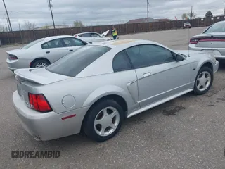 2000 Ford Mustang GT with VIN 1FAFP42X9YF173747, listed as a IAAI auction lot 41977220 with 169,097 mi miles. Bid and sale history available at carsss.com. Image 4.