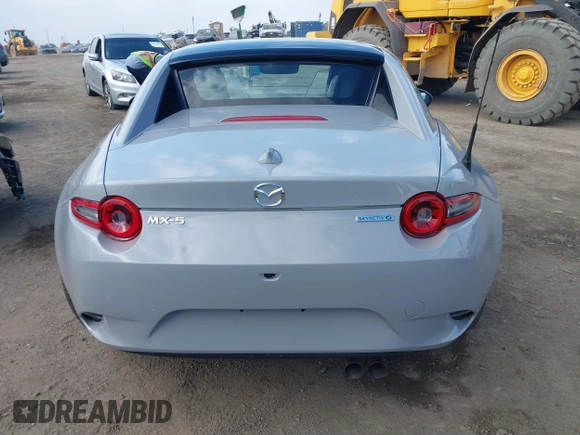 2024 Mazda MX-5 Miata Grand Touring z VIN JM1NDAM76R0602860, wystawiony jako IAAI lot #41346197 z przebiegiem 1 891 mil mil oraz . Historia ofert i sprzedaży dostępna na DreamBid. Obrazek 16.