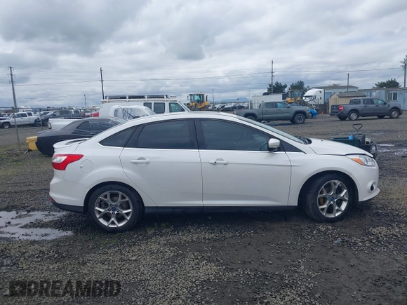 2014 Ford Focus Titanium with VIN 1FADP3J27EL142095, listed as a IAAI auction lot 42004419 with 139,515 mi miles. Bid and sale history available at carsss.com. Image 13.