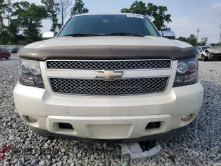 2011 Chevrolet Tahoe LTZ with VIN 1GNSCCE06BR346909, listed as a Copart auction lot 57366535 with 283,935 mi miles and Salvage title. Bid and sale history available at DreamBid. Image 5.