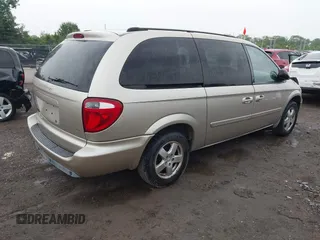 2005 Dodge Caravan SXT z VIN 2D4GP44L05R599391, wystawiony jako IAAI lot #42371619 z przebiegiem 116 468 mil mil oraz . Historia ofert i sprzedaży dostępna na DreamBid. Obrazek 4.