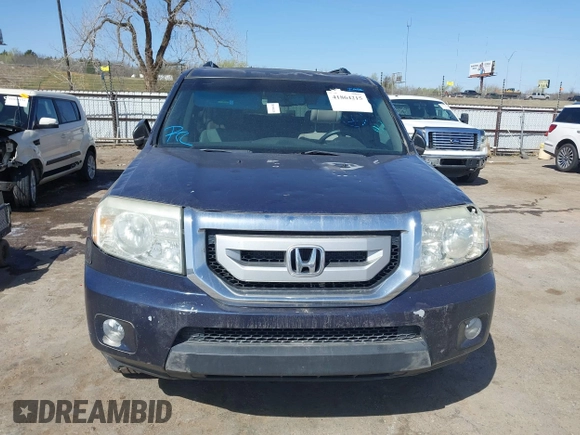2011 Honda Pilot EX-L with VIN 5FNYF4H6XBB022917, listed as a IAAI auction lot 41864215 with 36,923 mi miles and . Bid and sale history available at carsss.com. Image 12.