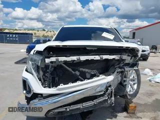 2019 GMC Sierra 1500 SLT z VIN 3GTP8DED7KG268973, wystawiony jako IAAI lot #42224064 z przebiegiem 98 871 mil mil oraz . Historia ofert i sprzedaży dostępna na DreamBid. Obrazek 13.