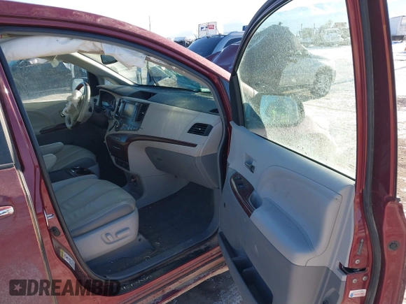 2014 Toyota Sienna XLE with VIN 5TDYK3DC5ES425818, listed as a IAAI auction lot 41421282 with 105,586 mi miles and . Bid and sale history available at DreamBid. Image 5.