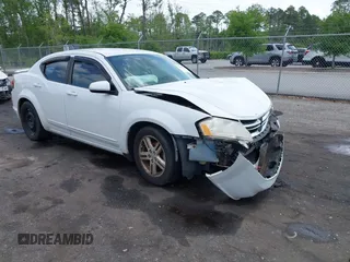 2012 Dodge Avenger SXT with VIN 1C3CDZCB5CN156288, listed as a IAAI auction lot 42115638 with 157,534 mi miles and . Bid and sale history available at carsss.com. Image 1.