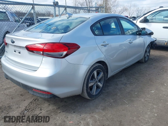 2018 Kia Forte LX with VIN 3KPFL4A77JE274020, listed as a IAAI auction lot 41919650 with 94,568 mi miles and . Bid and sale history available at DreamBid. Image 4.