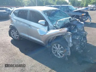 2020 Hyundai Tucson SE z VIN KM8J2CA43LU114214, wystawiony jako IAAI lot #42528153 z przebiegiem 97 650 mil mil oraz . Historia ofert i sprzedaży dostępna na DreamBid. Obrazek 1.