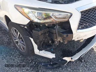 2016 Infiniti QX60 with VIN 5N1AL0MM9GC514586, listed as a IAAI auction lot 41861058 with 151,741 mi miles. Bid and sale history available at carsss.com. Image 17.