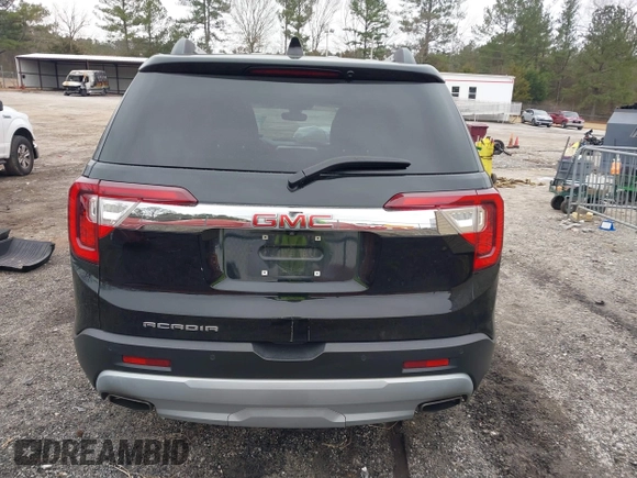 2021 GMC Acadia SLT with VIN 1GKKNMLS0MZ209789, listed as a IAAI auction lot 41521978 with 104,690 mi miles. Bid and sale history available at carsss.com. Image 16.