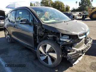 2019 BMW i3 with VIN WBY8P4C51K7E84270, listed as a Copart auction lot 77707224 with 15,584 mi miles and Salvage Title. Bid and sale history available at carsss.com. Image 4.
