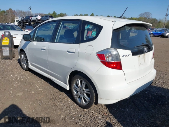 2009 Honda Fit Sport w/Navi with VIN JHMGE88609C002848, listed as a IAAI auction lot 42121403 with 168,138 mi miles. Bid and sale history available at carsss.com. Image 3.