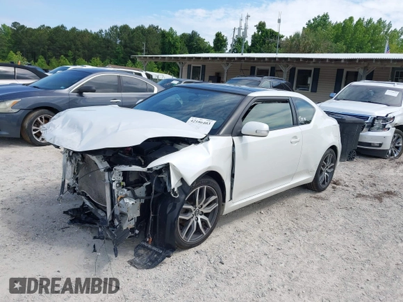 2015 Scion tC z VIN JTKJF5C79F3093318, wystawiony jako IAAI lot #42186403 z przebiegiem 178 922 mil mil oraz . Historia ofert i sprzedaży dostępna na DreamBid. Obrazek 17.