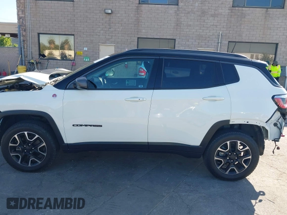 2020 Jeep Compass Trailhawk with VIN 3C4NJDDB4LT144129, listed as a IAAI auction lot 42582688 with 67,112 mi miles and . Bid and sale history available at DreamBid. Image 15.