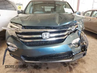 2016 Honda Pilot Elite with VIN 5FNYF6H09GB085621, listed as a IAAI auction lot 41788911 with 137,199 mi miles. Bid and sale history available at carsss.com. Image 6.