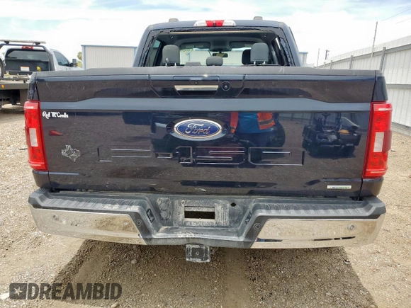 2021 Ford F-150 XL with VIN 1FTFW1E80MFA32611, listed as a Copart auction lot 61899255 with 98,278 mi miles and Salvage title. Bid and sale history available at DreamBid. Image 6.