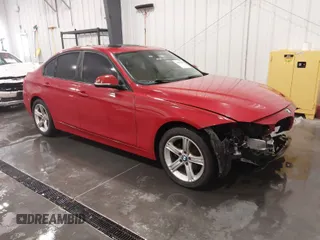 2015 BMW 3 Series 328i xDrive with VIN WBA3B3C51FJ984520, listed as a IAAI auction lot 41593469 with 147,756 mi miles. Bid and sale history available at carsss.com. Image 1.