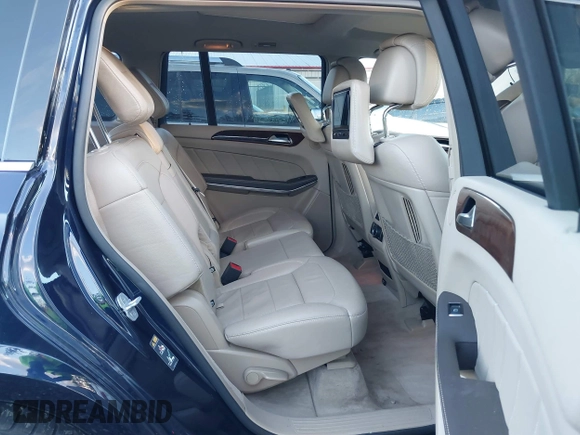 2016 Mercedes-Benz GL with VIN 4JGDF7DE2GA661379, listed as a IAAI auction lot 41059705 with 60,558 mi miles. Bid and sale history available at carsss.com. Image 8.