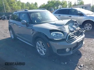 2019 MINI Countryman Cooper with VIN WMZYV5C57K3F57744, listed as a IAAI auction lot 42404507 with 93,570 mi miles and . Bid and sale history available at DreamBid. Image 1.