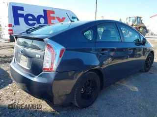 2014 Toyota Prius Four with VIN JTDKN3DU6E1760525, listed as a IAAI auction lot 42004587 with 211,534 mi miles and . Bid and sale history available at DreamBid. Image 4.