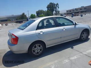 2004 Kia Spectra LX z VIN KNAFE122145036611, wystawiony jako IAAI lot #42490340 z przebiegiem 219 316 mil mil oraz . Historia ofert i sprzedaży dostępna na DreamBid. Obrazek 4.