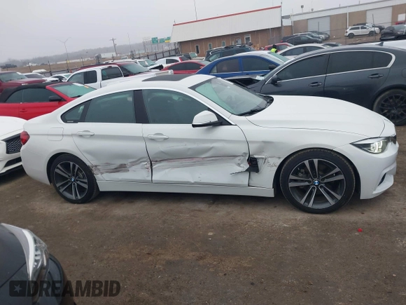 2020 BMW 4 Series 430i with VIN WBA4J1C03LCD79546, listed as a IAAI auction lot 41500883 with 33,729 mi miles and . Bid and sale history available at DreamBid. Image 13.